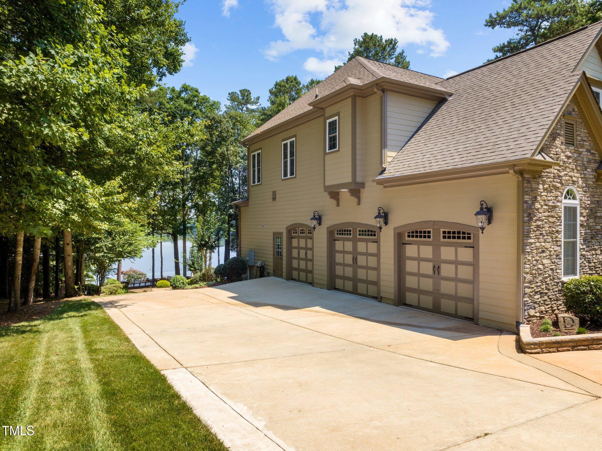 901 Edgewater Drive Garner, NC 27529 - Photo 64 of 72 a view of a house with a yard