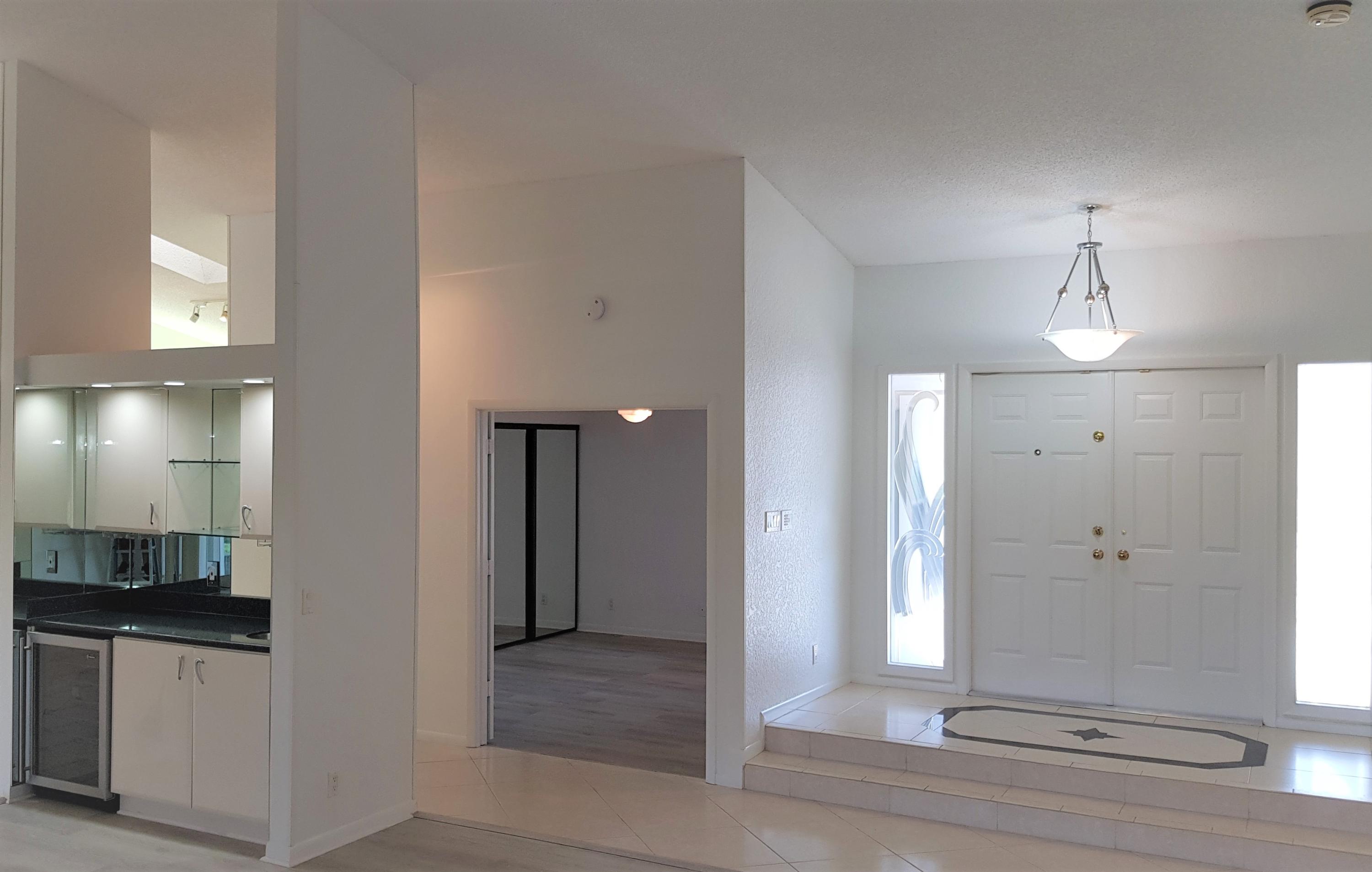 8585 Eagle Run Drive Boca Raton, FL 33434 - Photo 11 of 58 Interior Wet Bar 3rd Bed Open