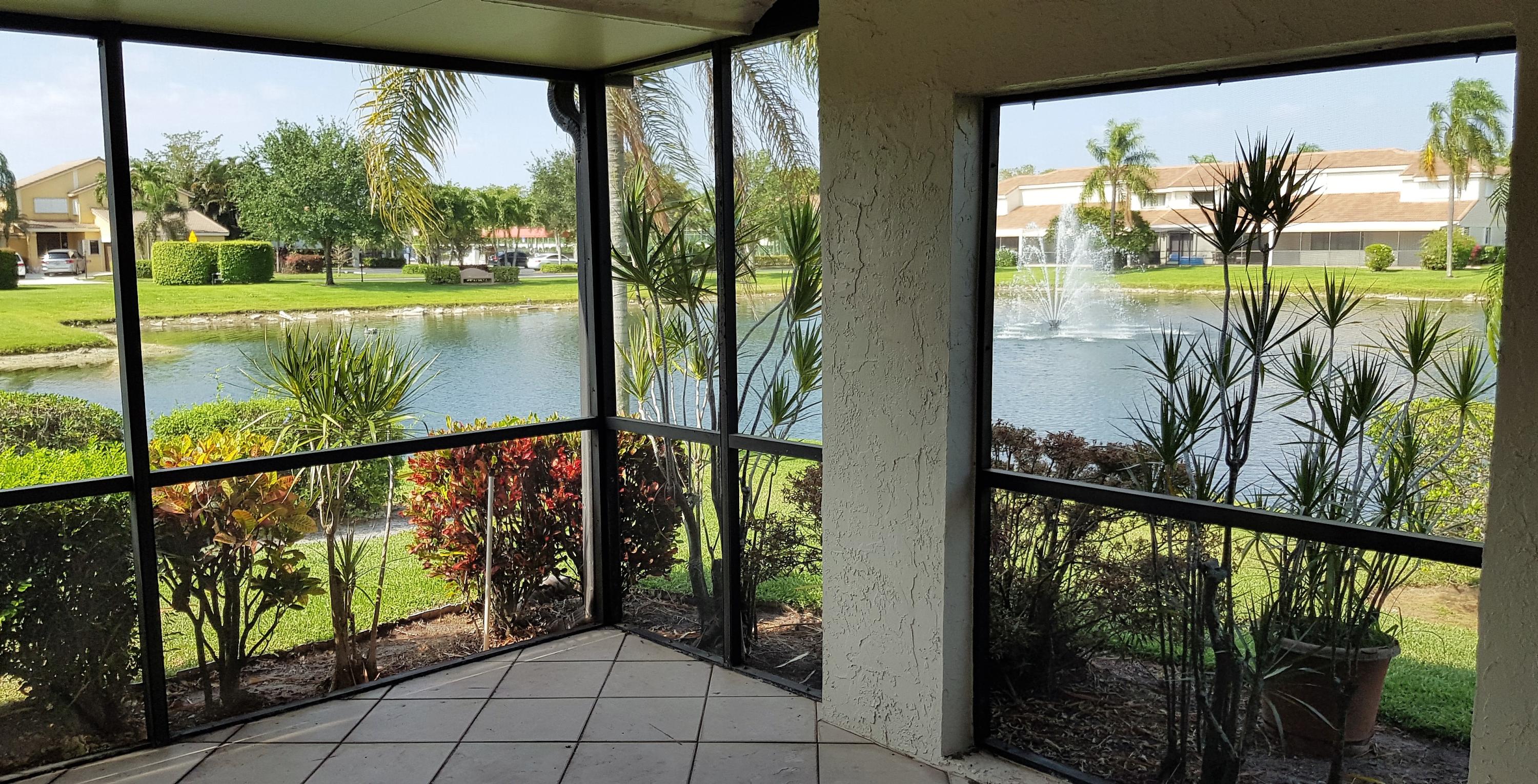 8585 Eagle Run Drive Boca Raton, FL 33434 - Photo 15 of 58 Kitchen View of Lake