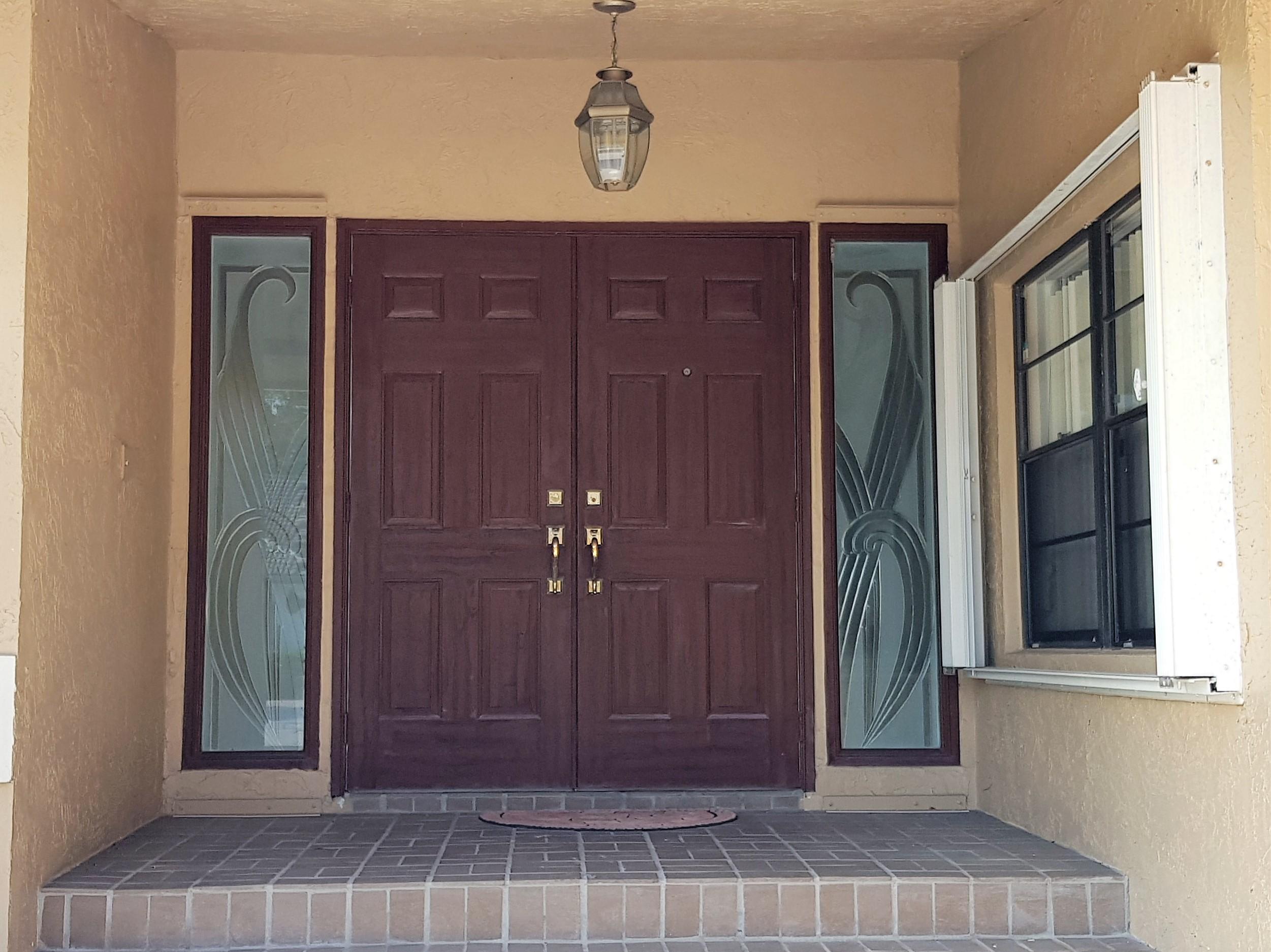 8585 Eagle Run Drive Boca Raton, FL 33434 - Photo 4 of 58 Front Door Closed
