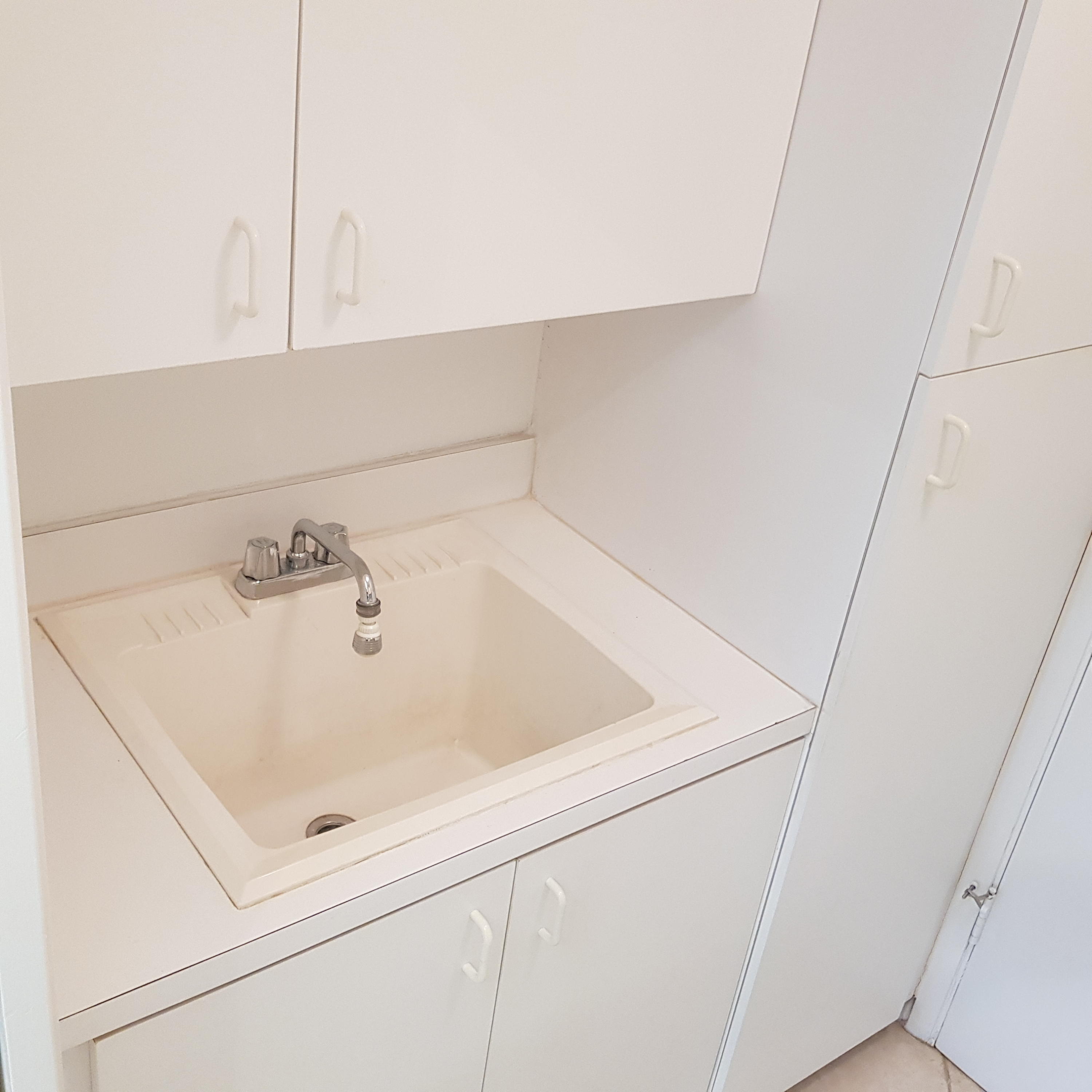 8585 Eagle Run Drive Boca Raton, FL 33434 - Photo 47 of 58 Laundry Sink 1
