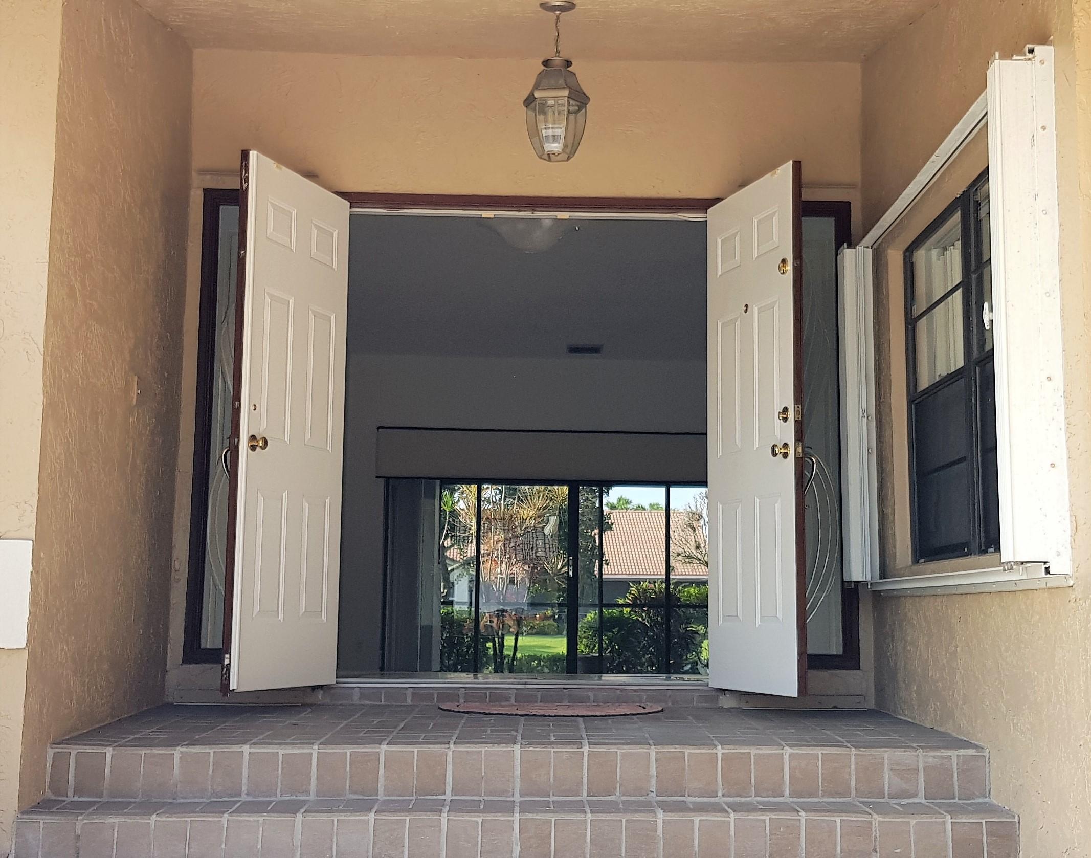 8585 Eagle Run Drive Boca Raton, FL 33434 - Photo 5 of 58 Front Door Open
