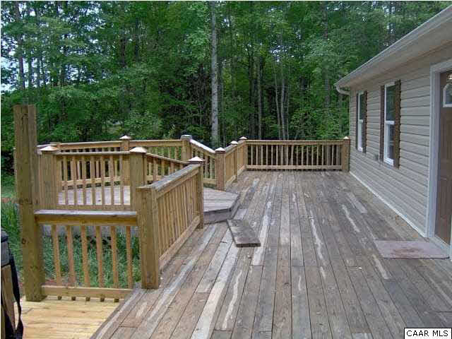 621 Buffalo Road Dillwyn, VA 23936 - Photo 2 of 6 a view of balcony with wooden floor and fence