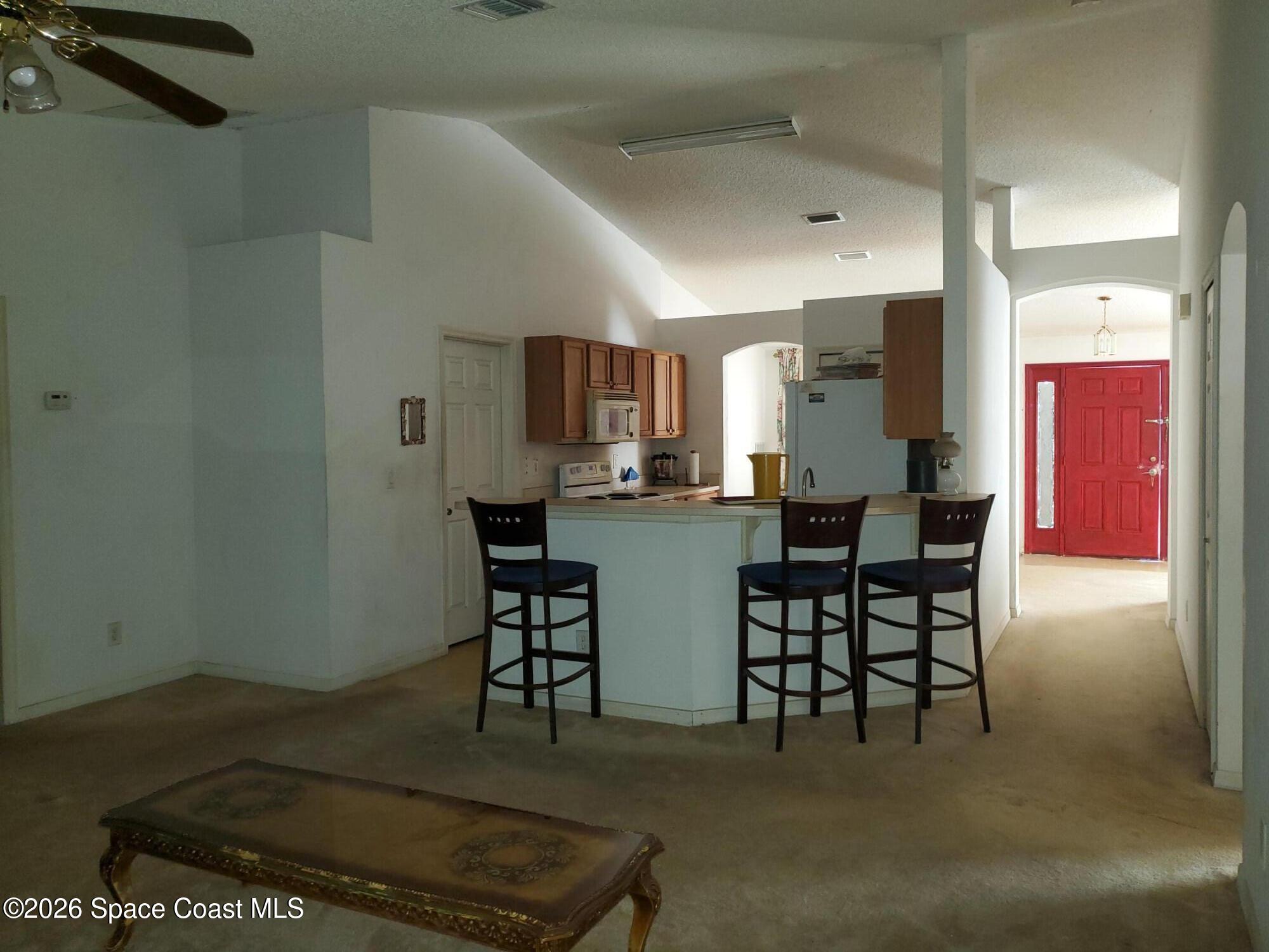 2960 Toulon Road Southeast Palm Bay, FL 32909 - Photo 5 of 20 Kitchen Island