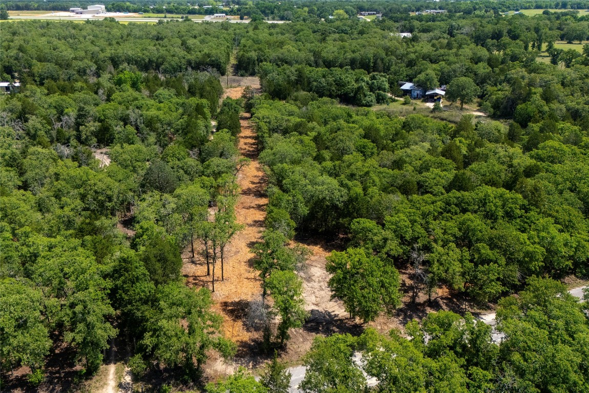Tbd Whipperwill Lane Elgin, TX 78621 - Photo 12 of 19 an aerial view of residential house with outdoor space and trees all around