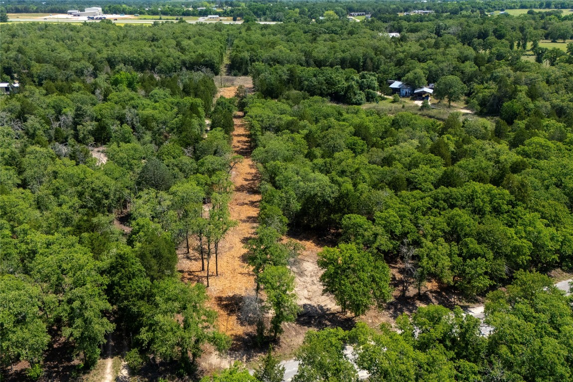 Tbd Whipperwill Lane Elgin, TX 78621 - Photo 13 of 19 an aerial view of residential house with outdoor space and trees all around