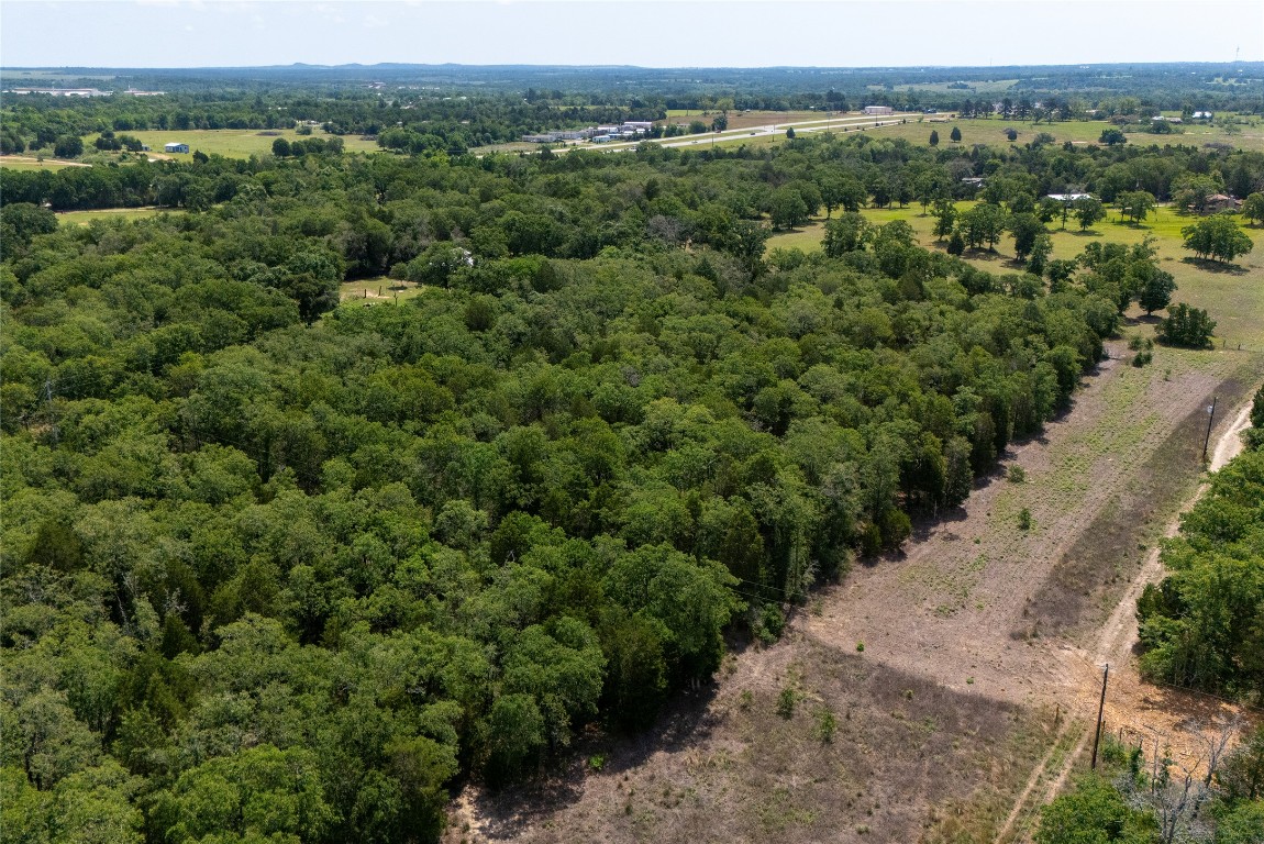 Tbd Whipperwill Lane Elgin, TX 78621 - Photo 14 of 19 an aerial view of a house with a yard