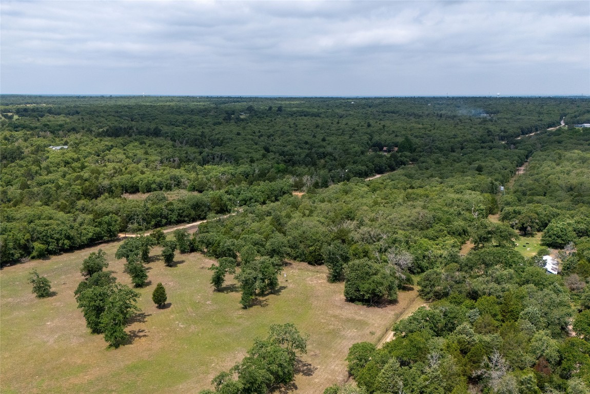 Tbd Whipperwill Lane Elgin, TX 78621 - Photo 16 of 19 a view of a lake with a city
