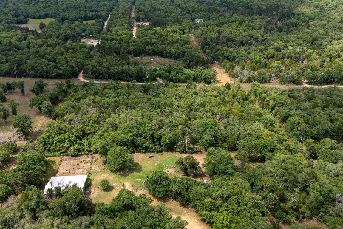 Tbd Whipperwill Lane Elgin, TX 78621 - Photo 18 of 19 an aerial view of a house with a yard