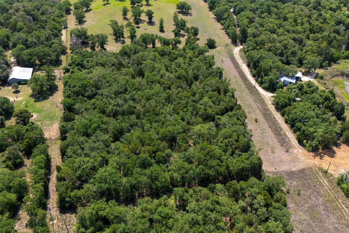 Tbd Whipperwill Lane Elgin, TX 78621 - Photo 4 of 19 an aerial view of a house with a yard