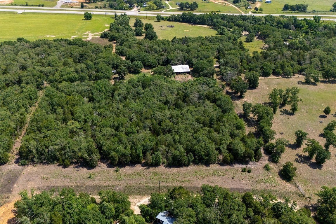 Tbd Whipperwill Lane Elgin, TX 78621 - Photo 5 of 19 an aerial view of a houses with yard