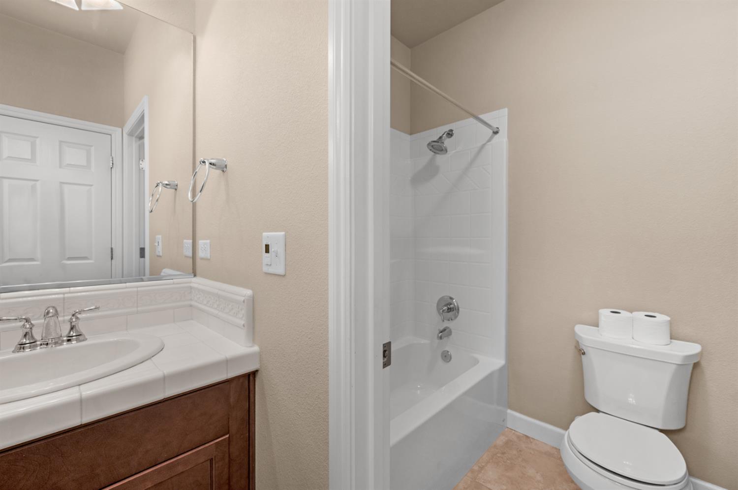 3267 Portals Avenue Clovis, CA 93619 - Photo 38 of 69 a bathroom with a sink toilet and shower