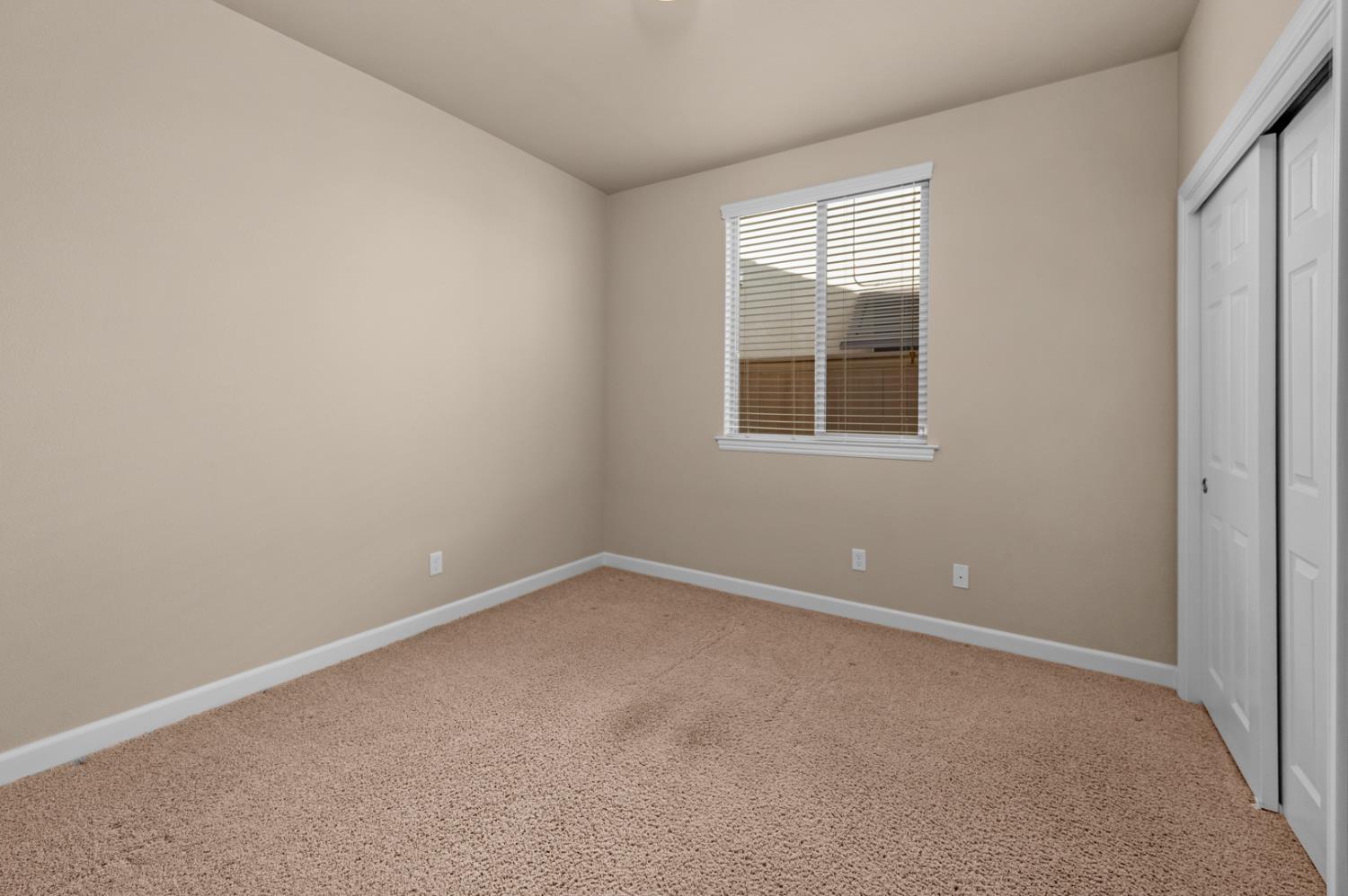 3267 Portals Avenue Clovis, CA 93619 - Photo 39 of 69 an empty room with a window
