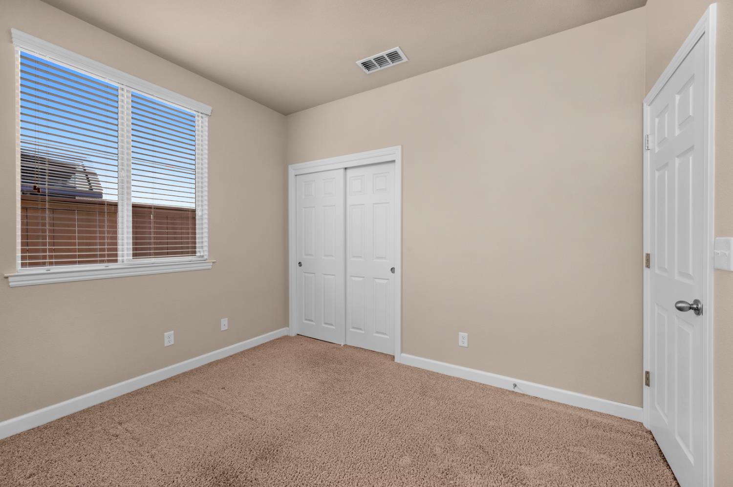 3267 Portals Avenue Clovis, CA 93619 - Photo 40 of 69 a view of an empty room with a window