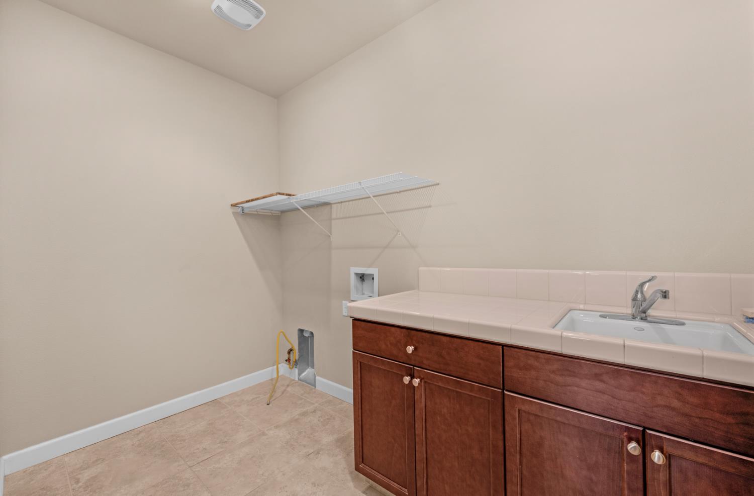 3267 Portals Avenue Clovis, CA 93619 - Photo 41 of 69 a view of a sink and cabinets