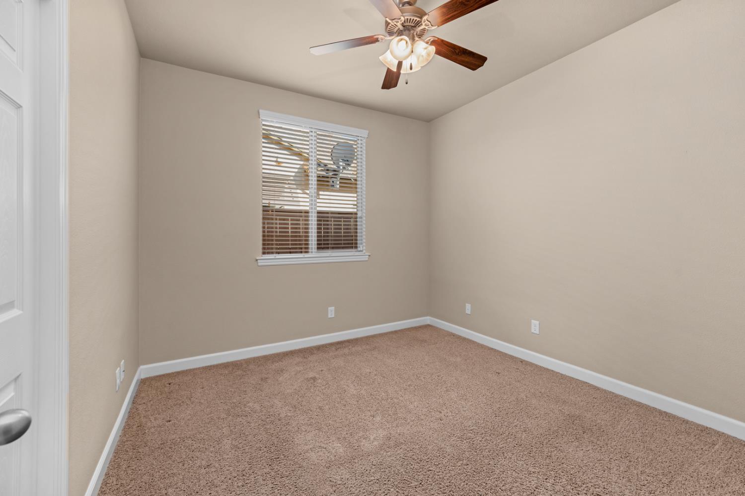 3267 Portals Avenue Clovis, CA 93619 - Photo 42 of 69 an empty room with a window