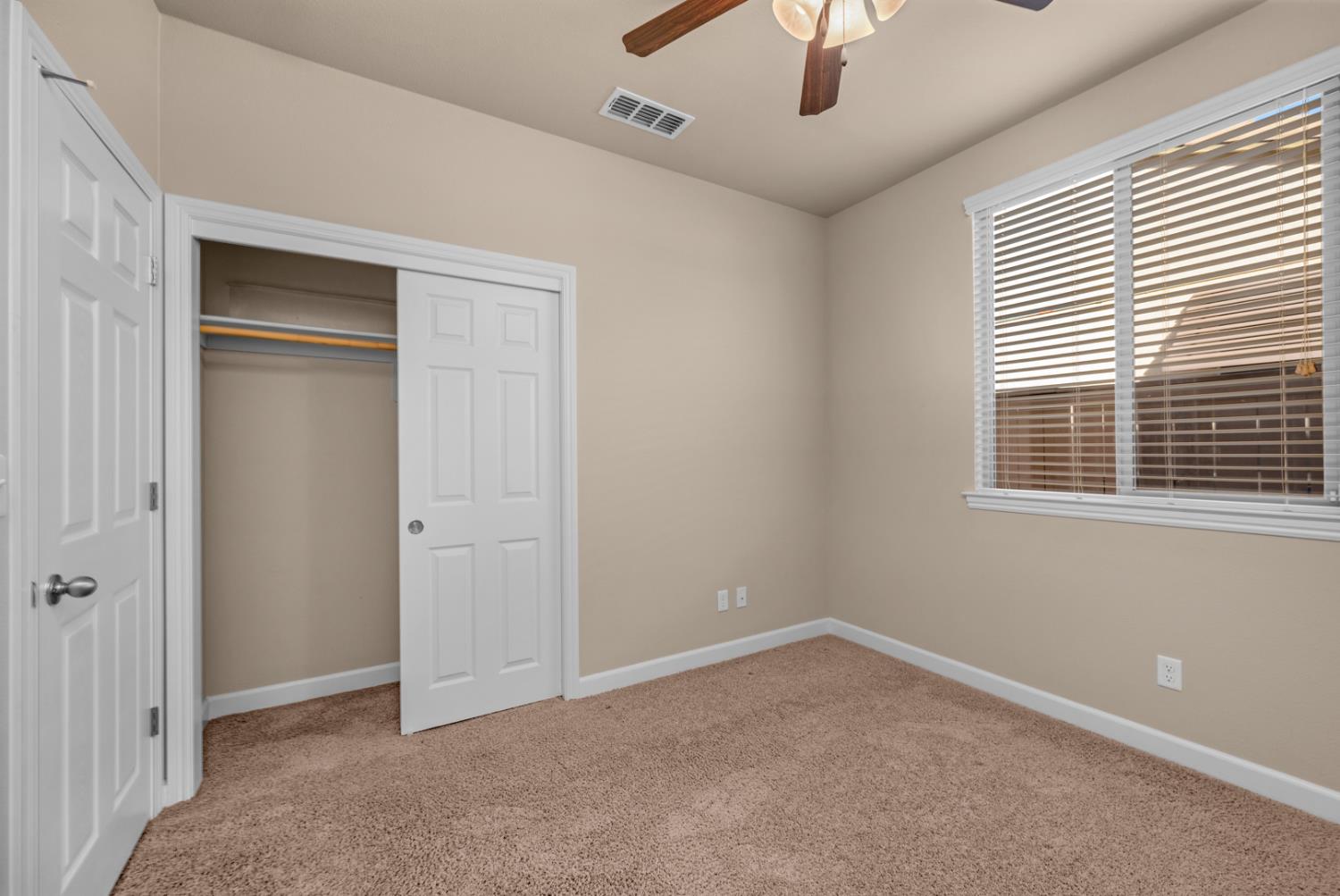 3267 Portals Avenue Clovis, CA 93619 - Photo 43 of 69 a view of an empty room with a window