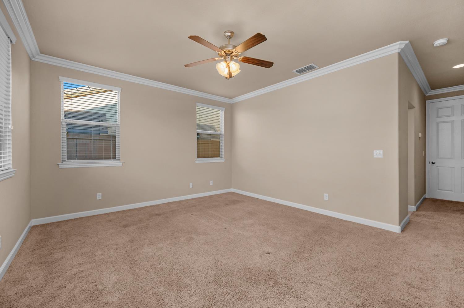 3267 Portals Avenue Clovis, CA 93619 - Photo 50 of 69 a view of an empty room with a ceiling fan