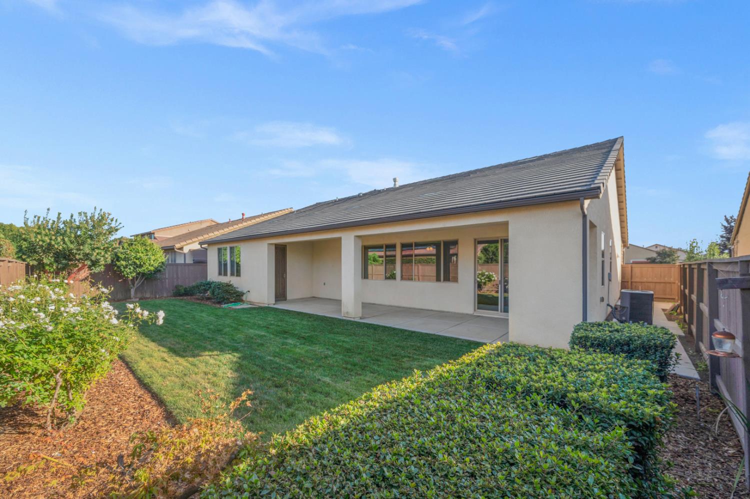 3267 Portals Avenue Clovis, CA 93619 - Photo 54 of 69 a front view of house with yard and green space