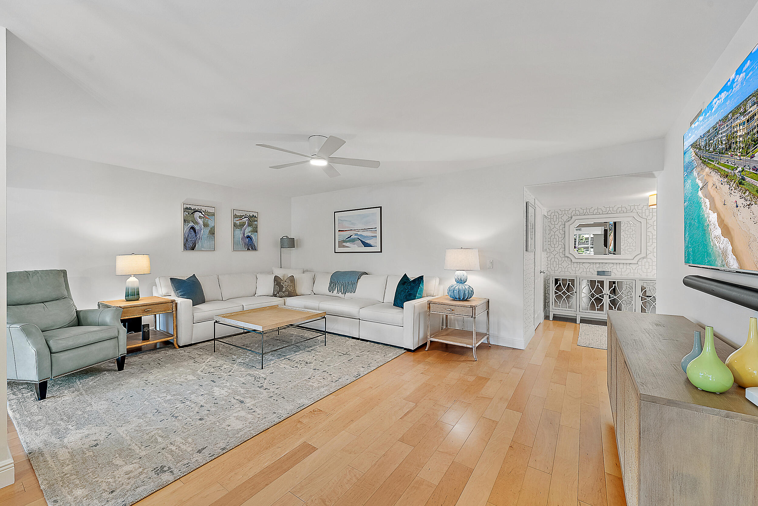 16647 Traders Crossing North, Unit 126 Jupiter, FL 33477 - Photo 15 of 45 a living room with furniture and a couch