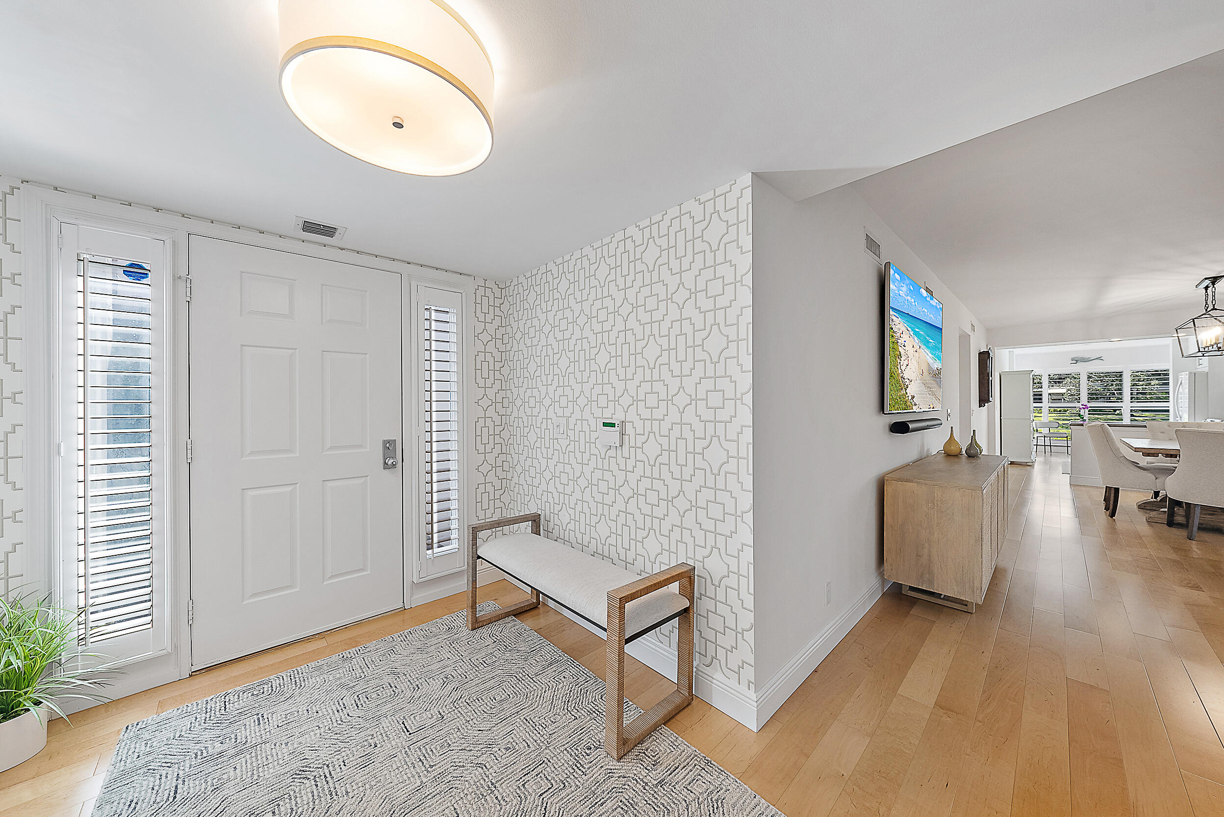 16647 Traders Crossing North, Unit 126 Jupiter, FL 33477 - Photo 28 of 45 a living room with furniture