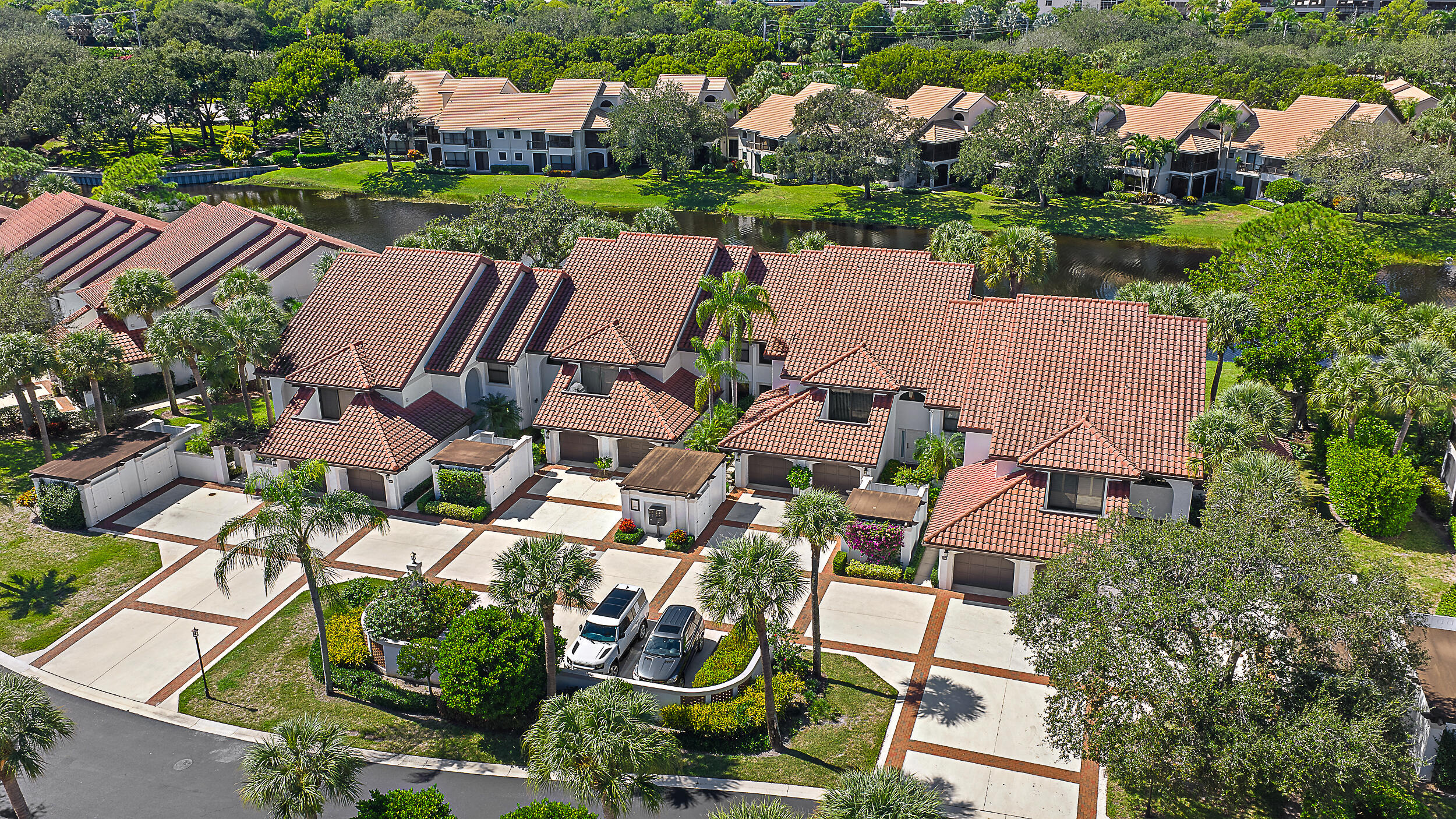 16647 Traders Crossing North, Unit 126 Jupiter, FL 33477 - Photo 35 of 45 an aerial view of house with yard swimming pool and outdoor seating