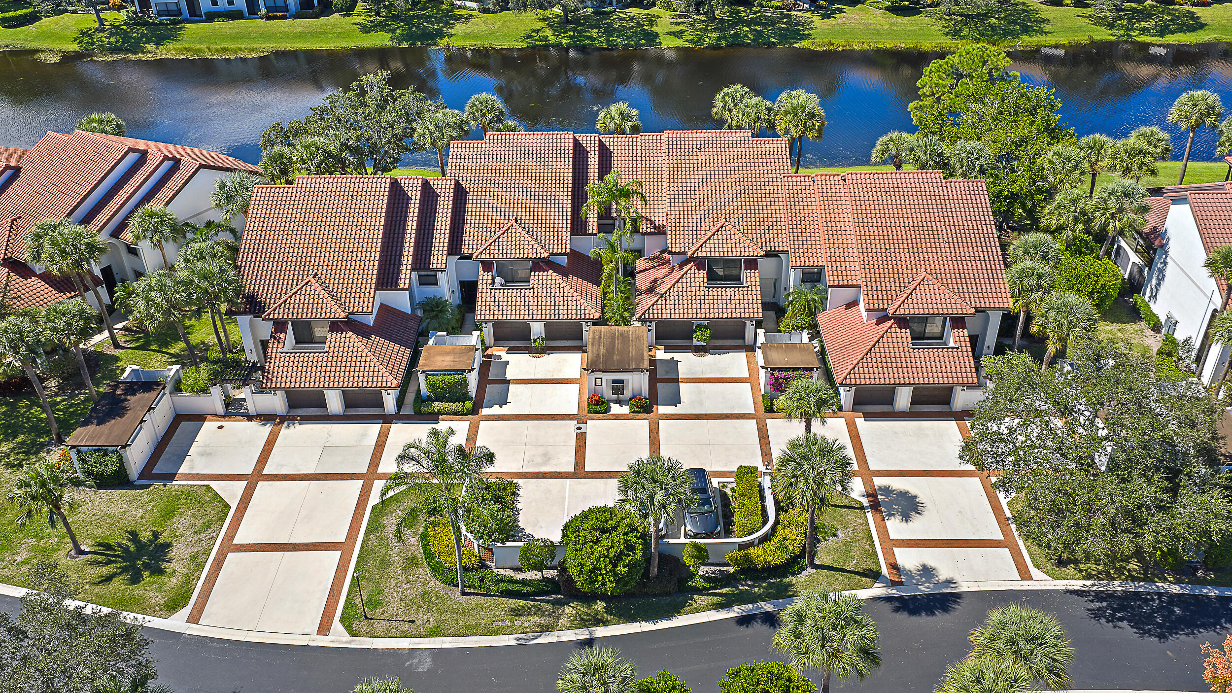 16647 Traders Crossing North, Unit 126 Jupiter, FL 33477 - Photo 36 of 45 an aerial view of a house with outdoor space and lake view