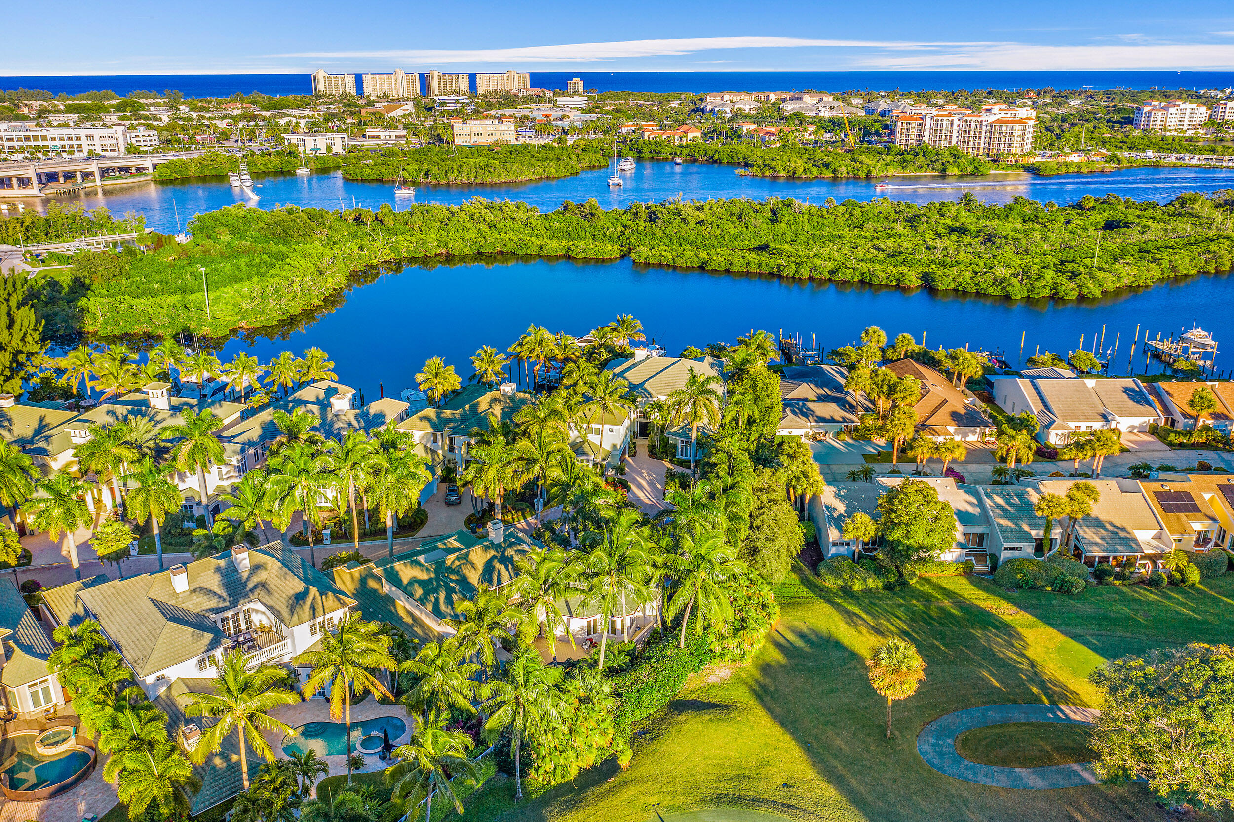 16647 Traders Crossing North, Unit 126 Jupiter, FL 33477 - Photo 41 of 45 a view of swimming pool and an outdoor seating