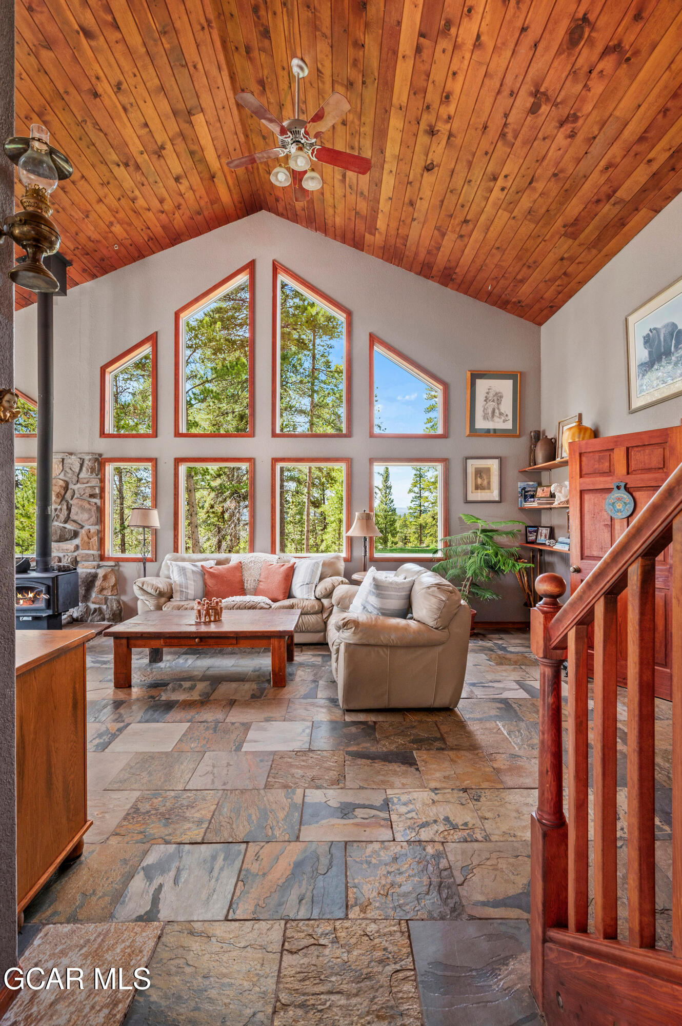 732 Gcr 8311/ Clayton Ranch Road Tabernash, CO 80478 - Photo 30 of 65 a living room with furniture and a large window