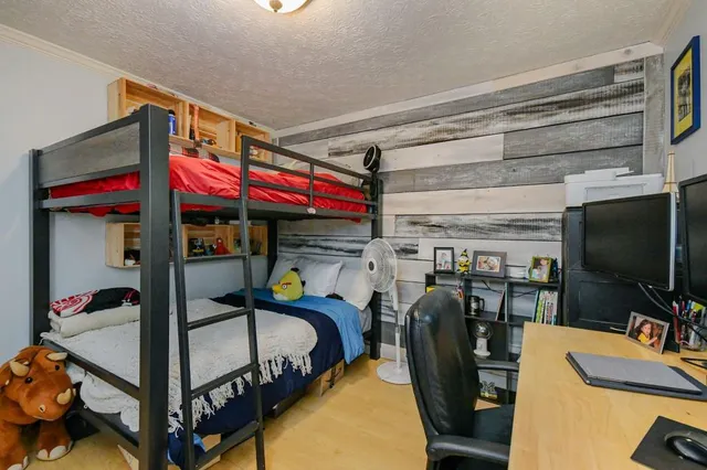 a bedroom with furniture