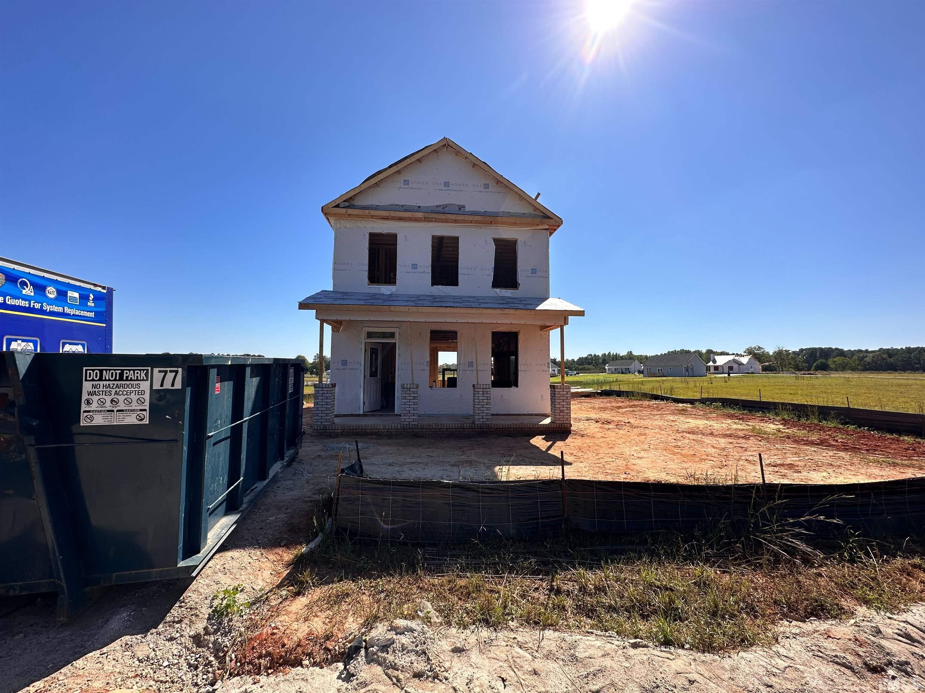 345 Longbow Drive Middlesex, NC 27557 - Photo 2 of 9 a front view of a house with a yard