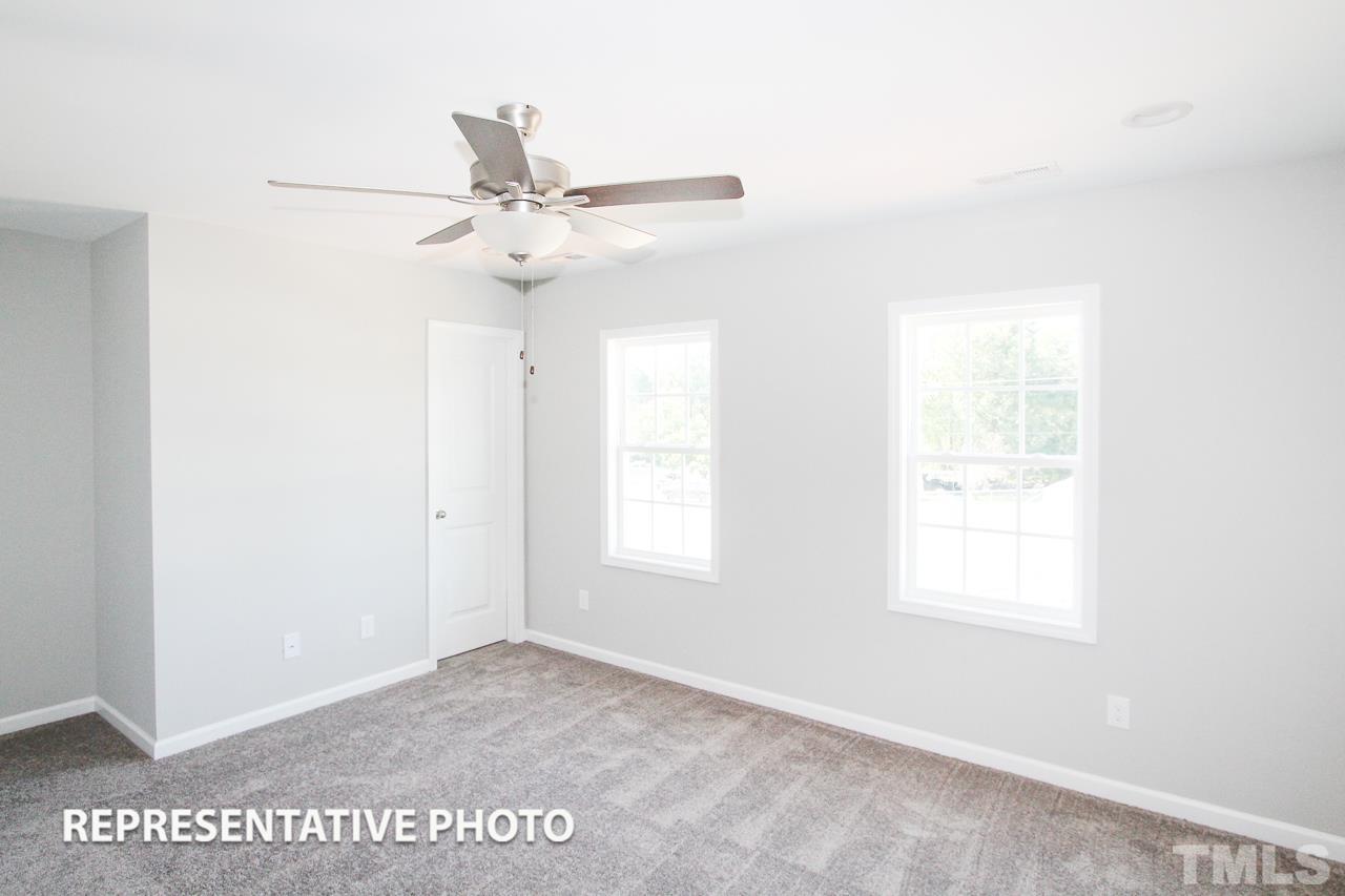 345 Longbow Drive Middlesex, NC 27557 - Photo 6 of 9 a view of an empty room with a window