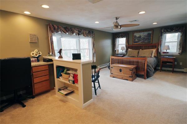 5 Acre Road Billerica, MA 01821 - Photo 11 of 30 a living room with furniture gym equipment and a window