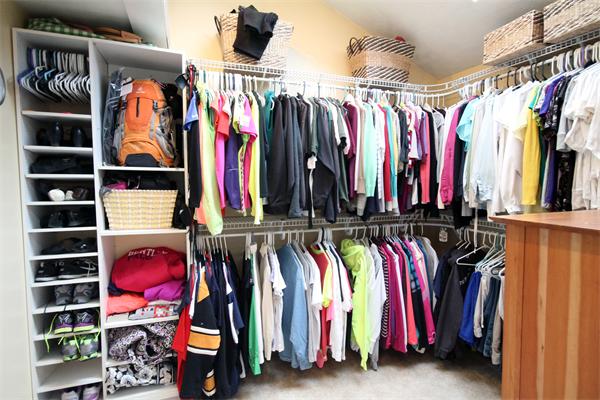 5 Acre Road Billerica, MA 01821 - Photo 15 of 30 a view of walk in closet with clothes