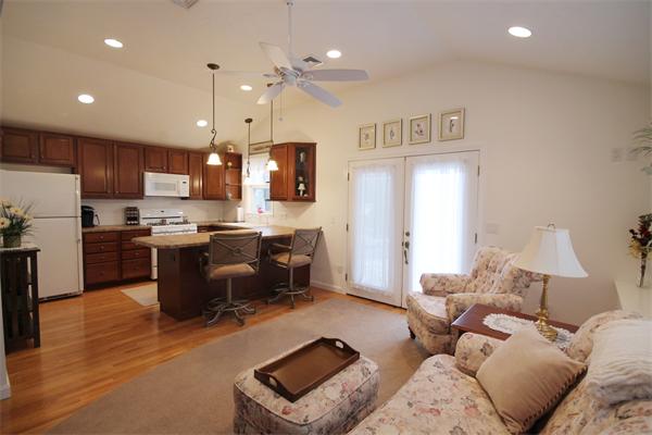 5 Acre Road Billerica, MA 01821 - Photo 23 of 30 a living room with furniture and kitchen view