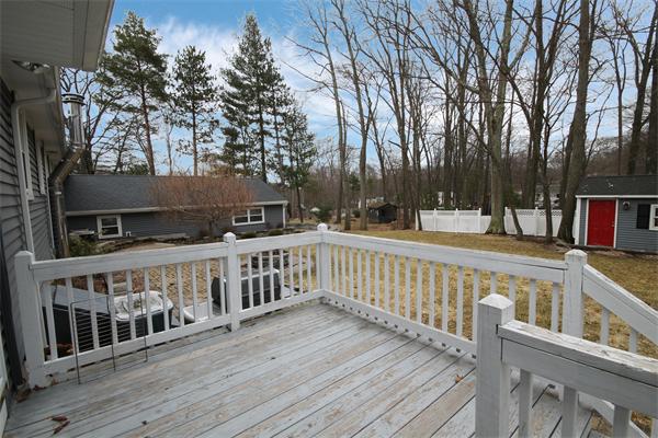 5 Acre Road Billerica, MA 01821 - Photo 29 of 30 a view of balcony with wooden floor and fence