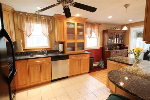 5 Acre Road Billerica, MA 01821 - Photo 4 of 30 a kitchen with stainless steel appliances granite countertop a stove and a sink