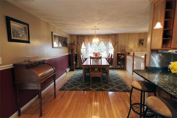 5 Acre Road Billerica, MA 01821 - Photo 6 of 30 a living room with furniture and a wooden floor