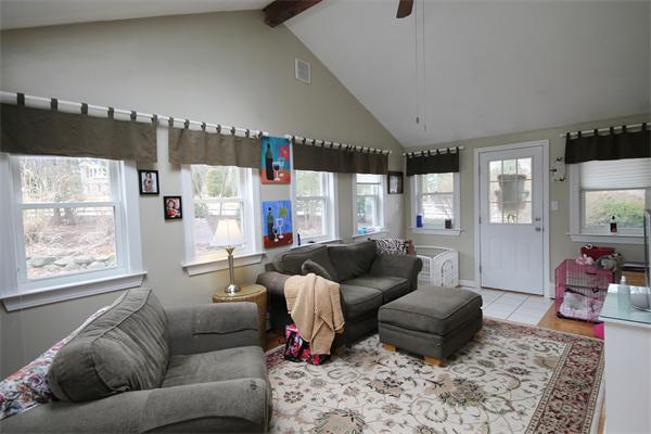 5 Acre Road Billerica, MA 01821 - Photo 8 of 30 a living room with furniture wooden floor and a large window