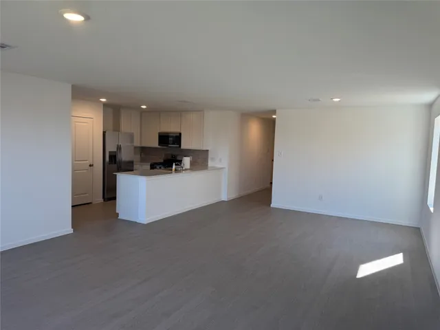 a view of a kitchen with a sink