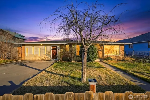 a view of a house with wooden floor and a tub