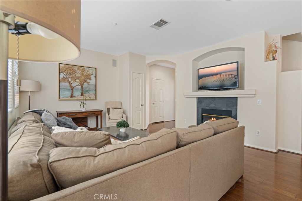 3073 Via Maximo Carlsbad, CA 92009 - Photo 12 of 21 Living room with fireplace