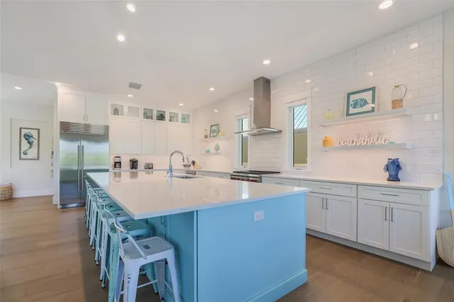 a spacious bathroom with a sink mirror and a shower