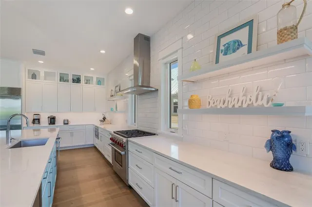 a bathroom with a sink a shower and a bathtub