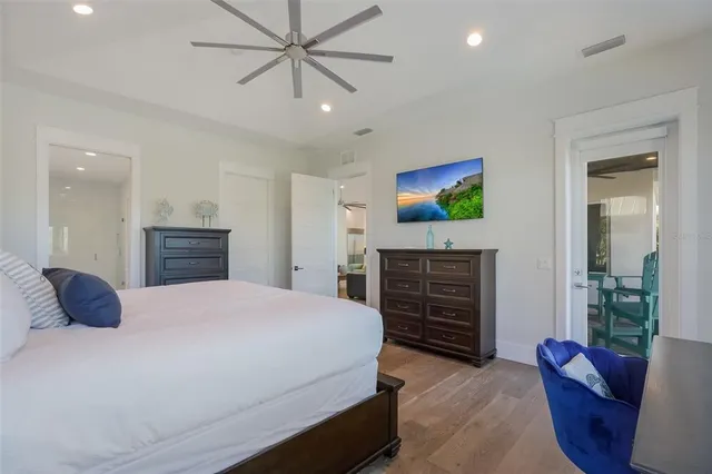 a living room with pool table and a flat screen tv