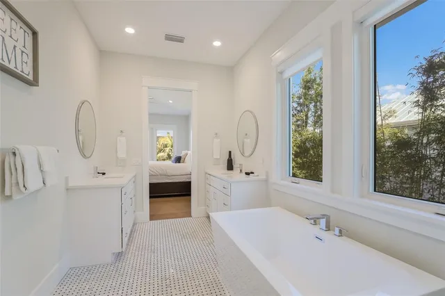 a view of a patio with a table and chairs