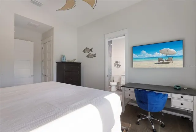 a view of a chairs and table in a patio