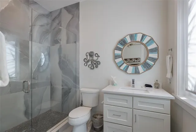 a view of a house with pool and sitting area