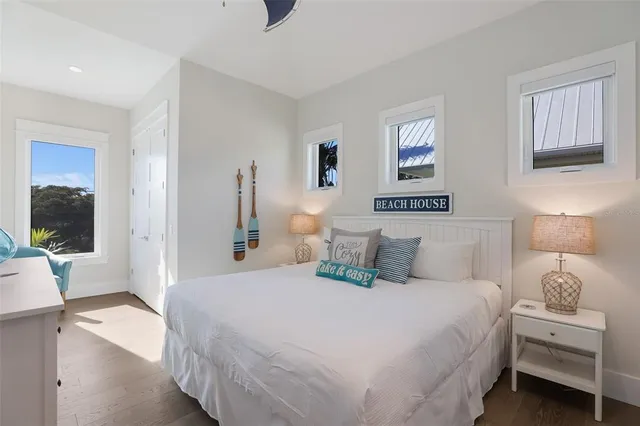 a view of a swimming pool with a garden and plants