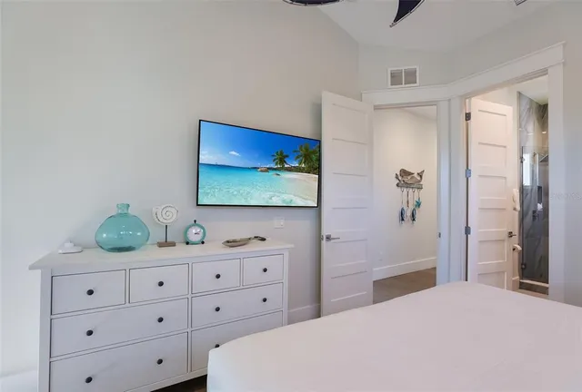 a view of an house with swimming pool and porch